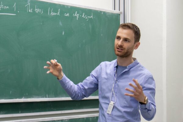 Oliver Janzer gave a talk on finding a subgraph of large average degree on a small vertex set at the Discrete Math Seminar
