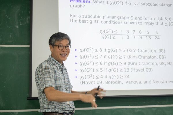 Seog-Jin Kim (김석진) gave a talk on the list chromatic number of the square of subcubic planar graphs of girth at least 6 at the Discrete Math Seminar