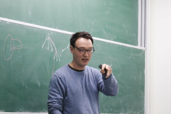Robert Hickingbotham gave a talk on a partition of a planar graph into connected induced subgraphs of bounded size so that all long paths intersect some part more than once at the Discrete Math Seminar
