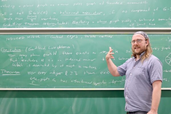 J. Pascal Gollin gave a talk on the existence of a balanced separator dominated by small number of vertices in a graph excluding a wheel as an induced minor at the Discrete Math Seminar