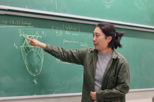 Xiying Du gave a talk on the characterization of graphs admitting, for any pair (X,Y) of vertex sets of size 2 and 3, two disjoint connected subgraphs containing X and Y, respectively, at the Discrete Math Seminar